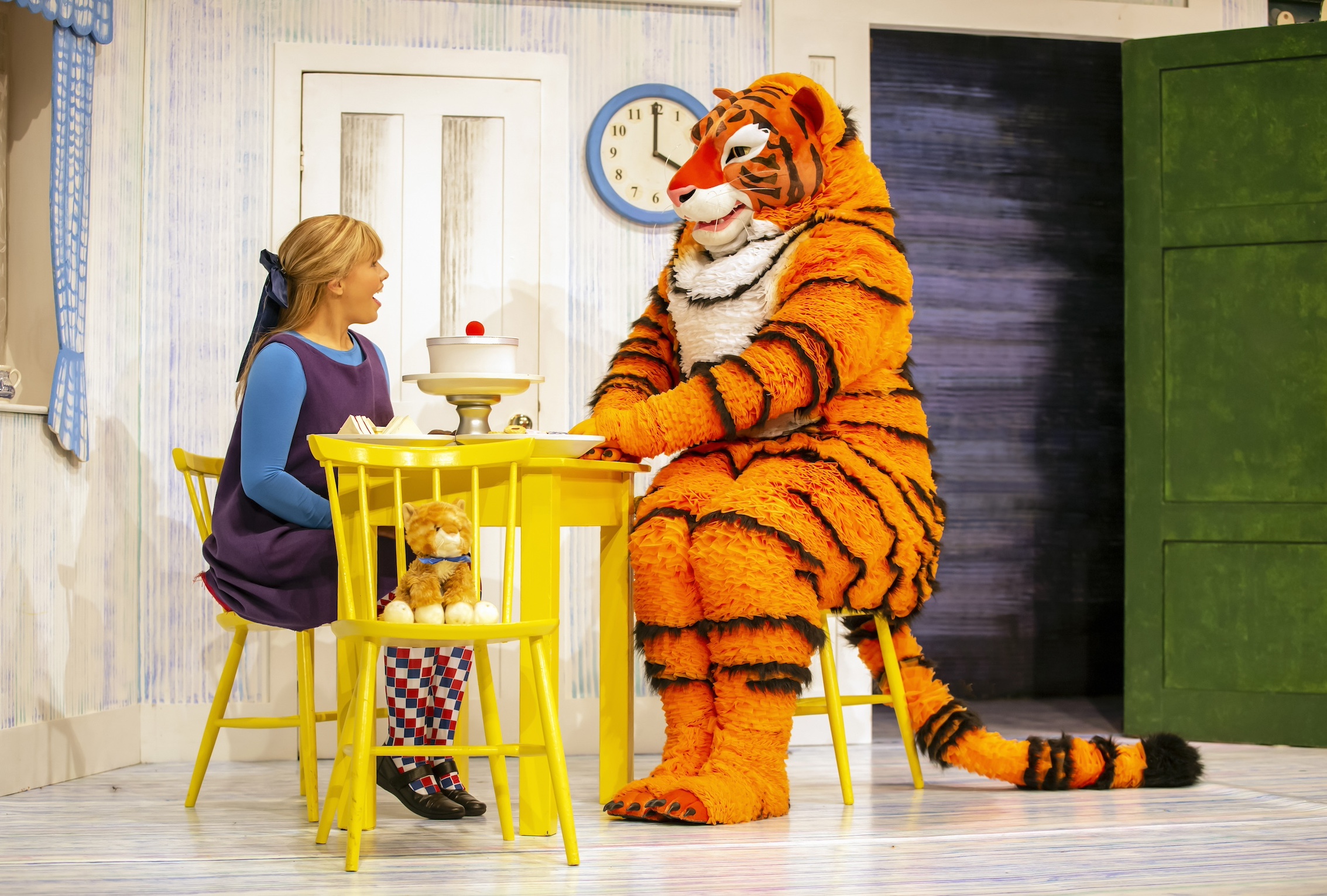 Tiger and girl at stage performance of the tiger who came to tea