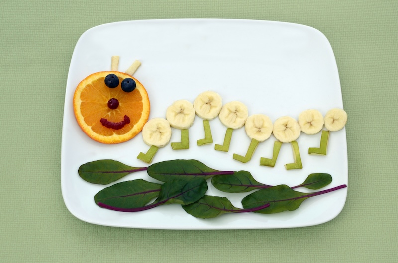 Creative kids snacks of caterpillar made of fruits