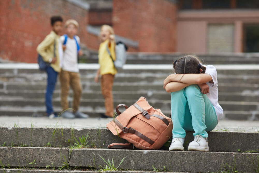 Girl setting because friend bullying